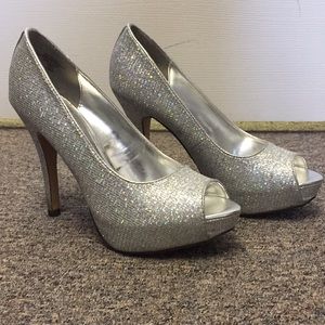 Silver heels with AB sparkle. Size 6.5.